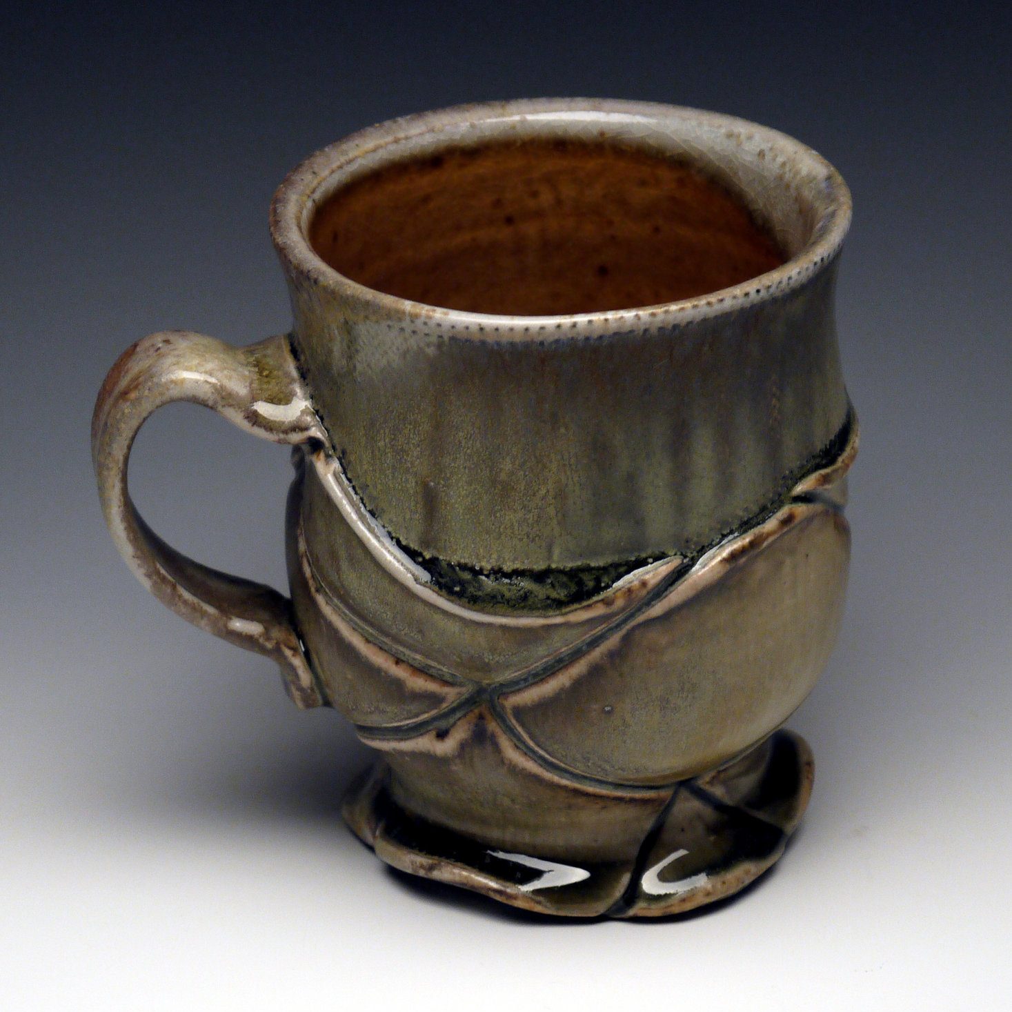 Coffee / Tea Cup, green celadon, shino glaze, wood fired porcelain